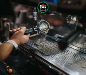 Professional coffee machine cleaning and descaling, removing limescale from espresso machine components.